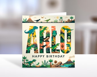 May include: A square birthday greeting card featuring the name ARLO in large, blocky letters filled with colourful dinosaur illustrations, palm trees, and volcanoes. The text HAPPY BIRTHDAY appears below, surrounded by a prehistoric jungle scene.