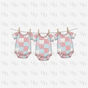 May include: Three baby onesies hanging on a clothesline. Each onesie has a patchwork design with pink, blue, and white floral squares. The onesies are secured with wooden clothespins, suggesting a vintage or handmade aesthetic.