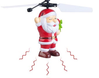 Papá Noel volando un dron para niños