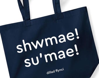 Stylish maxi tote bag in a range of colours with a cool text Welsh SHWMAE SU'MAE logo - multifunctional, reusable and sustainable.