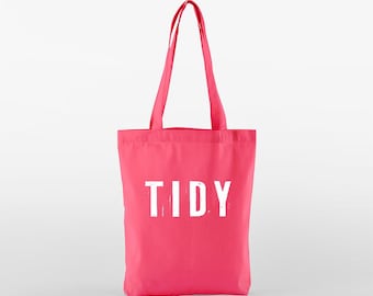 A cute stylish mini tote bag in a wide range of colours with a cool distressed text TIDY logo - multifunctional, reusable and sustainable.