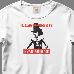 Llap-Goch Master Fear No Man Graphic T-shirt | Secret Welsh Art of Self-defence Design Top. Ideal Present or Gift tee for Monty Python Fans.