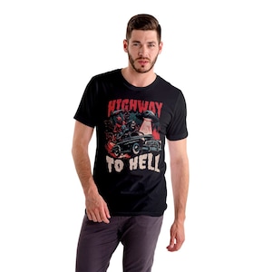 May include: A black t-shirt featuring a graphic print of a car driving on a highway with the text "Highway to Hell".