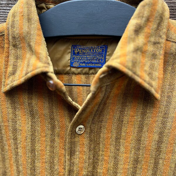 Vintage mid 60’s’s Pendleton striped, brown, orange and gold wool shirt. Size L