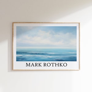 May include: A framed painting of a seascape with a blue sky and ocean. The painting is signed "MARK ROTHKO" in the bottom centre.