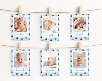 Peut inclure: Six photos de bébé étapes, chacune avec une photo de bébé et le mois. Les cartes sont bleues avec un motif de myrtilles et sont accrochées à une ficelle avec des pinces à linge en bois.