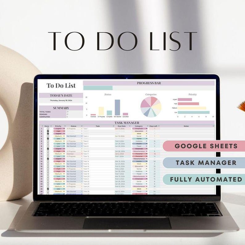 May include: A laptop displaying a "To Do List" spreadsheet with charts and data. The screen shows a task manager with the text "Google Sheets", "Task Manager", and "Fully Automated". The laptop is open on a white surface.