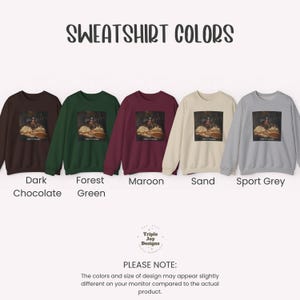 May include: Five crewneck sweatshirts in dark chocolate, forest green, maroon, sand, and sport grey. Each features a central rectangular graphic showing a table with food and the text HERE FOR THE BEER. The text SWEATSHIRT COLORS appears above.
