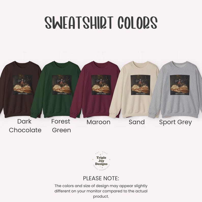 May include: Five crewneck sweatshirts in dark chocolate, forest green, maroon, sand, and sport grey. Each features a central rectangular graphic showing a table with food and the text HERE FOR THE BEER. The text SWEATSHIRT COLORS appears above.