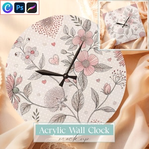 May include: Round acrylic wall clock featuring a floral design with pink flowers, gray leaves, and small pink hearts on a white background. The clock hands are black. The text "Acrylic Wall Clock mockup" is at the bottom.