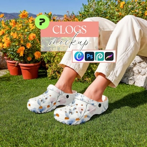 May include: White clogs with a floral pattern of blue, pink, and orange flowers. The clogs are on a green grassy surface. The image includes the text "CLOGS mockup" and icons for design software.
