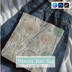 May include: A woven tote bag with a floral pattern featuring beige, green, and gray dandelion-like designs. The bag has black handles and is displayed on a pair of blue jeans. The text "Woven Tote Bag mockup" is visible.