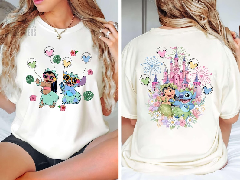 May include: A black tote bag with a white floral design. The bag has two handles and a rectangular shape. The floral pattern includes various flowers and leaves. The bag is made of a sturdy material.