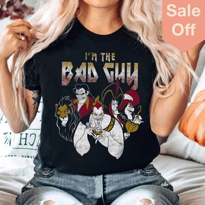May include: Black t-shirt with a graphic of Disney villains including Ursula, Jafar, and Scar. The text "I'm the Bad Guy" is printed in a metal font above the villains.