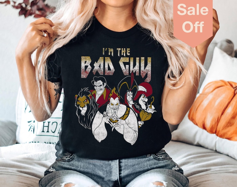 May include: Black t-shirt with a graphic of Disney villains including Ursula, Jafar, and Scar. The text "I'm the Bad Guy" is printed in a metal font above the villains.