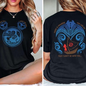 May include: Black t-shirt featuring a blue and white graphic design inspired by a Disney movie. The front design includes a Mickey Mouse-shaped image with text, and the back has a boat scene with text. A casual tee for fans.