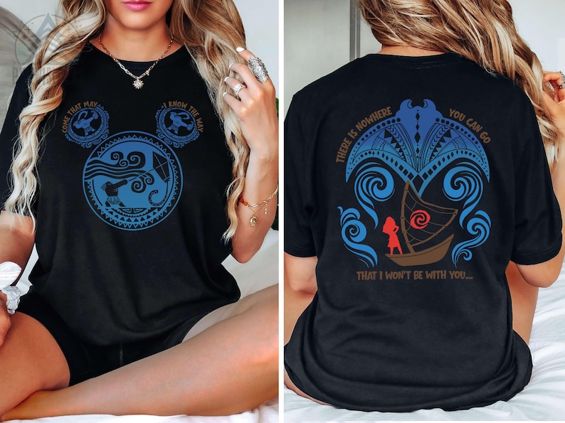 May include: Black t-shirt featuring a blue and white graphic design inspired by a Disney movie. The front design includes a Mickey Mouse-shaped image with text, and the back has a boat scene with text. A casual tee for fans.
