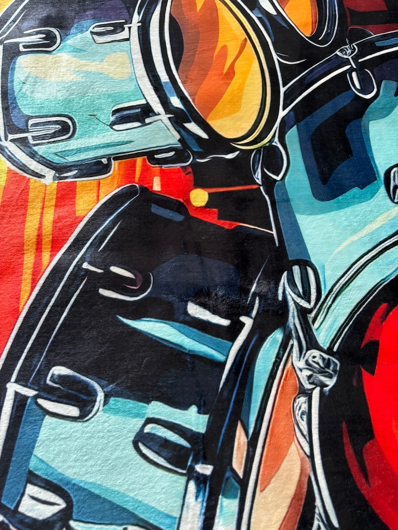 May include: Abstract art print featuring a close-up of a motorcycle. The artwork uses bold colors, including black, blue, red, and yellow. The design highlights the motorcycle's handlebars, mirrors, and body.