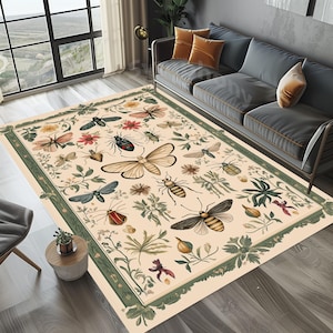 May include: A cream-colored rug with a green border features a vintage botanical illustration of various insects and flowers. The rug has a detailed design with a variety of insects, including butterflies, beetles, and dragonflies.