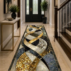 May include: A long rectangular runner rug featuring a complex geometric pattern of interlocking ribbons in shades of gold, black, white, and gray. The design incorporates mosaic-style tile textures and marble-like veining throughout the surface.