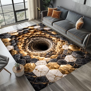May include: A hexagonal patterned area rug with a 3D optical illusion design. The rug features a central vortex effect with black, gold, and marble-like tiles. The rug is placed in a living room setting with a gray sofa and window.