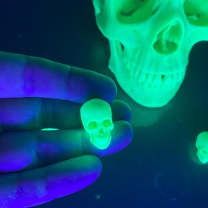 Now in radioactive Hulk green! "Micro Sapien" Anatomically Accurate Human Skull reduced in size to approximately 1 inch long.