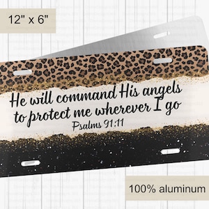 May include: A 12 inch by 6 inch aluminum license plate with a leopard print background and gold glitter. The text "He will command His angels to protect me wherever I go Psalms 91:11" is printed in black on a white background.