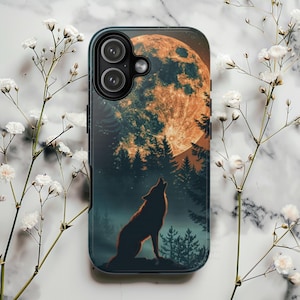 May include: A phone case featuring a wolf howling at a full moon. The design includes a silhouette of a wolf, a large orange moon, and a dark forest. The case has a black border and a glossy finish.