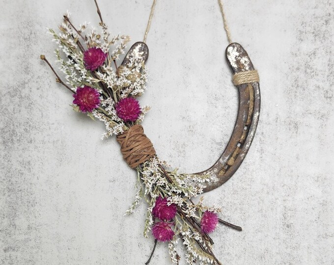 Hand decorated worn horseshoe for your home or makes a great gift
