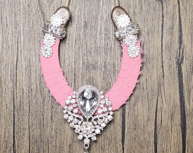 Hand decorated worn horseshoe