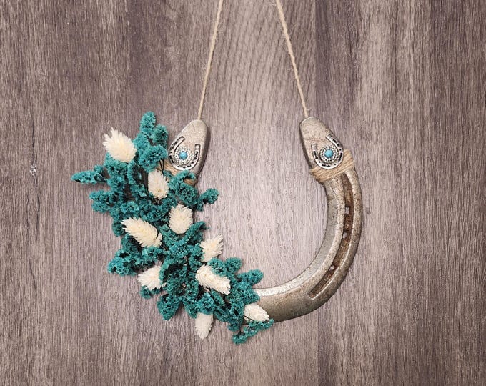 Hand decorated worn horseshoe