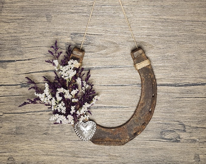 Hand decorated worn horseshoe for your home or makes a great gift