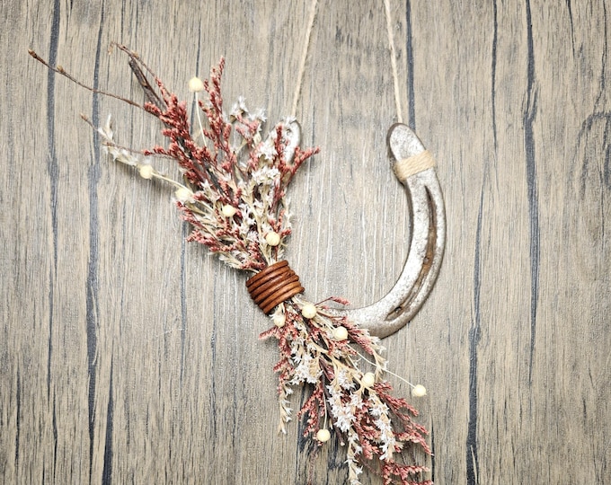 Hand decorated worn horseshoe for your home or makes a great gift