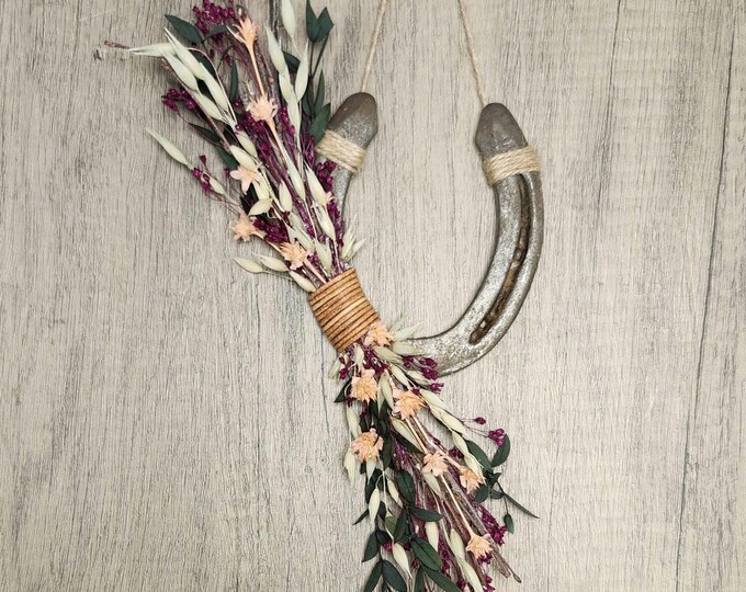 BRONCO BUSTER hand decorated worn horseshoe for your home or makes a great gift