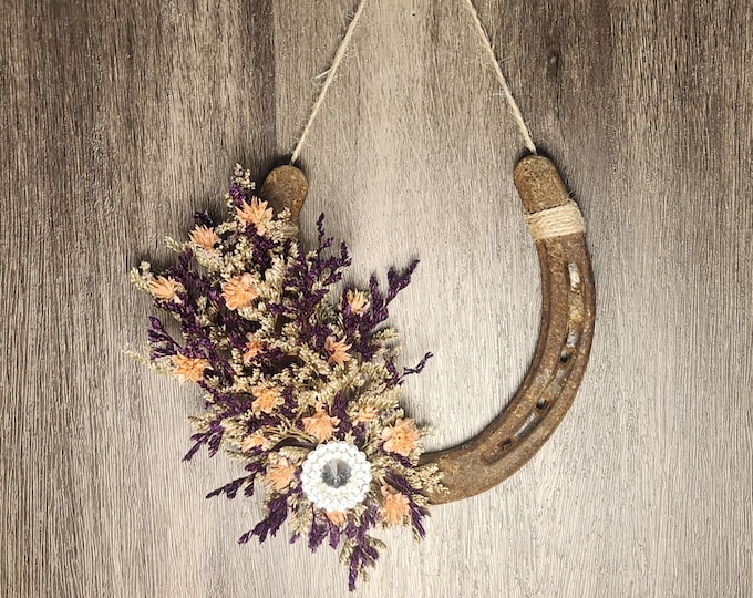 Hand decorated worn horseshoe for your home or makes a great gift
