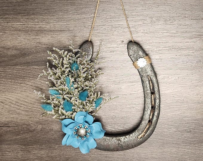 Hand decorated worn horseshoe for your home or makes a great gift