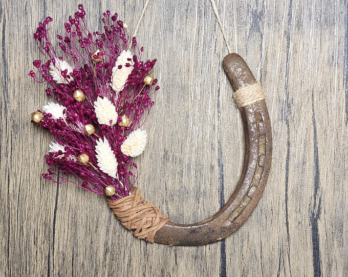 Hand decorated worn horseshoe for your home or makes a great gift