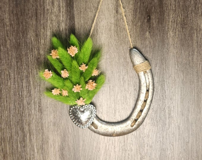 Hand decorated worn horseshoe for your home or makes a great gift