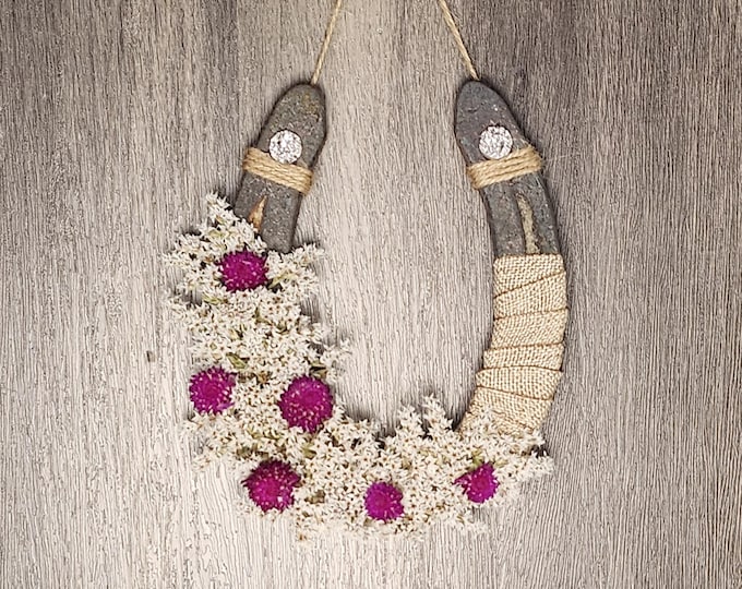 Hand decorated worn horseshoe