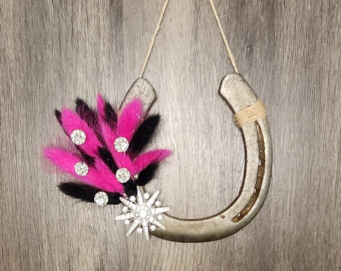 Hand decorated worn horseshoe