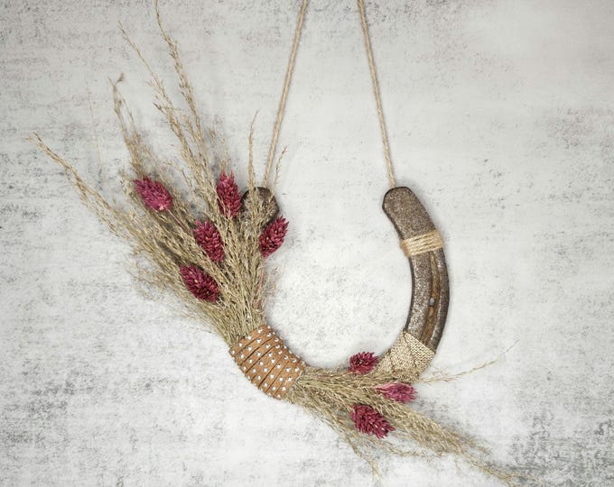 Hand decorated worn horseshoe for your home or makes a great gift
