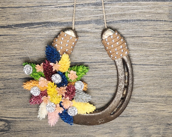Hand decorated worn horseshoe for your home or makes a great gift