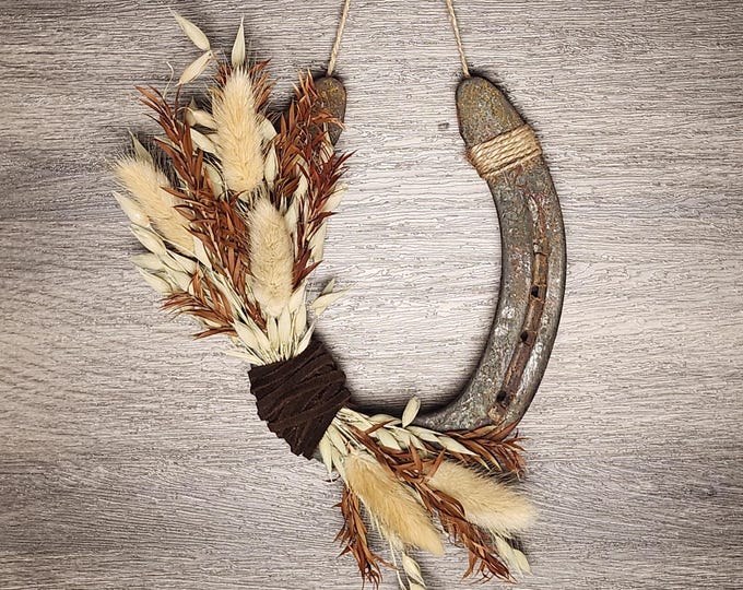 Hand decorated worn horseshoe for your home or makes a great gift