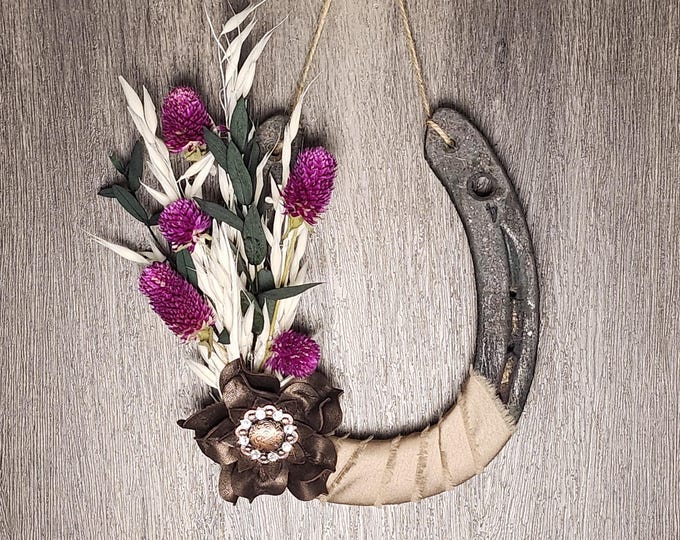 Hand decorated worn horseshoe for your home or makes a great gift