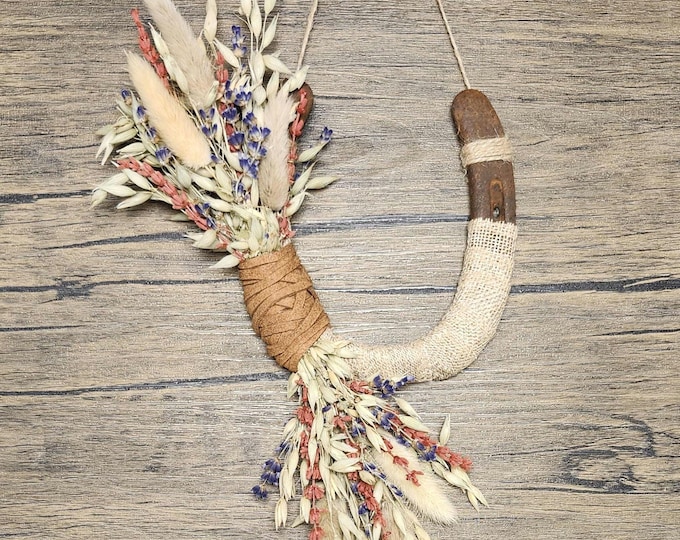 Hand decorated worn horseshoe