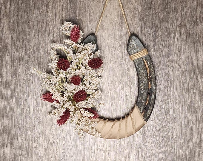 Hand decorated worn horseshoe for your home or makes a great gift