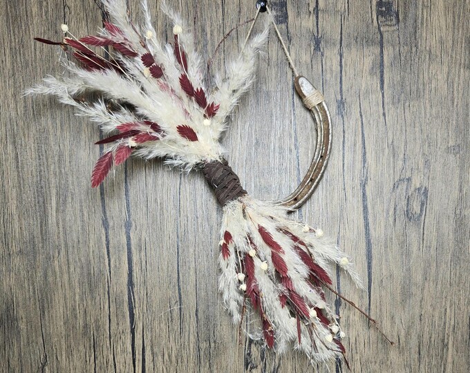 SILVERADO Hand decorated worn horseshoe for your home or makes a fantastic gift. One of a kind as no two horseshoes are alike.