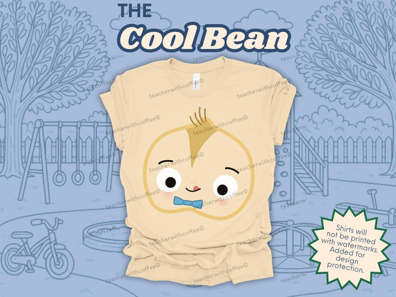 May include: A light tan t-shirt featuring a cartoon bean character with a blue bow tie and the text "The Cool Bean". The design is set against a blue background with a playground scene.