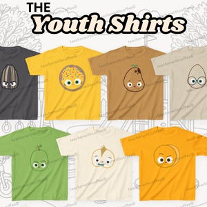 May include: Collection of youth shirts in various colors, each featuring a cartoon fruit or seed design. The shirts are displayed on a white background with the text "THE Youth Shirts" at the top.