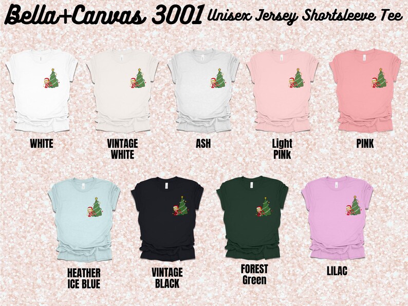 May include: A Bella+Canvas 3001 Unisex Jersey Short Sleeve Tee in ten different colors: white, vintage white, ash, light pink, pink, heather ice blue, vintage black, forest green, and lilac. Each shirt features a small graphic of a Christmas tree with a cartoon elf.